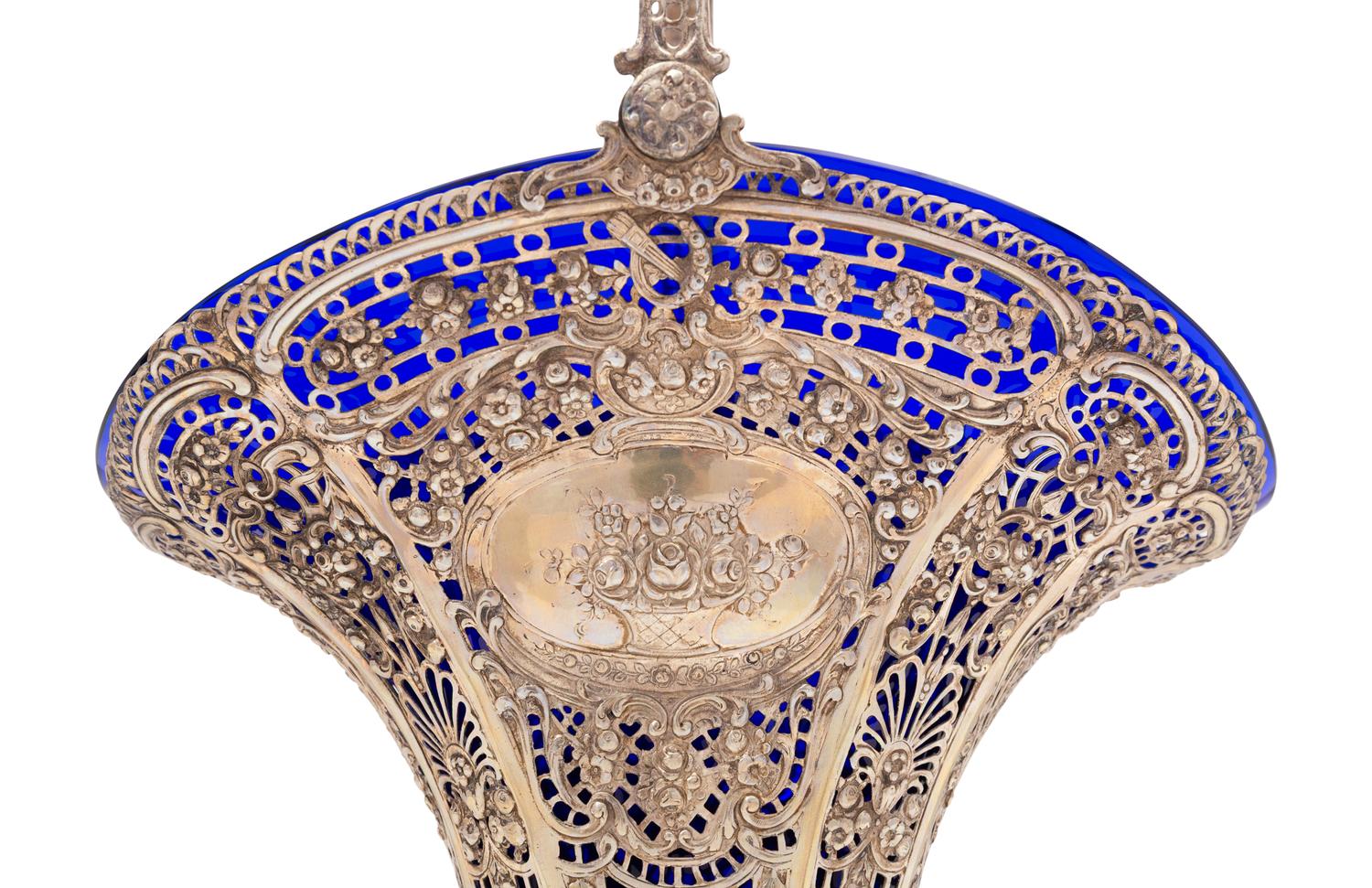 A German Silver Basket with Cobalt Glass Liner