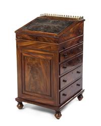 An English Mahogany Davenport Desk, Height 37 x width 19 5/8 x depth 21 7/8 inches.