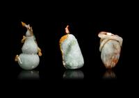 Three Chinese Russet and Green Jadeite Snuff Bottles