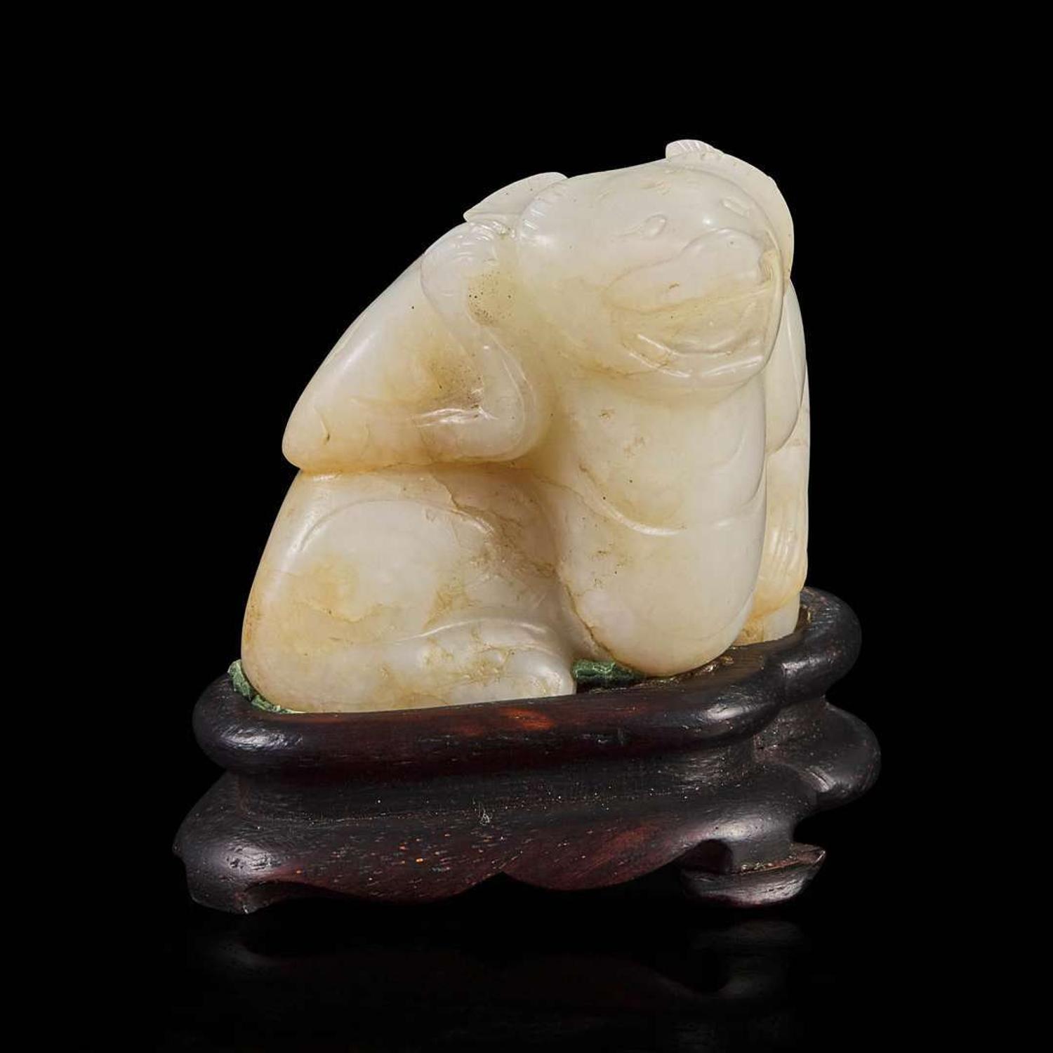 A Chinese creamy-white jade carving of a bear 白玉雕熊 Qing dynasty or earlier ????