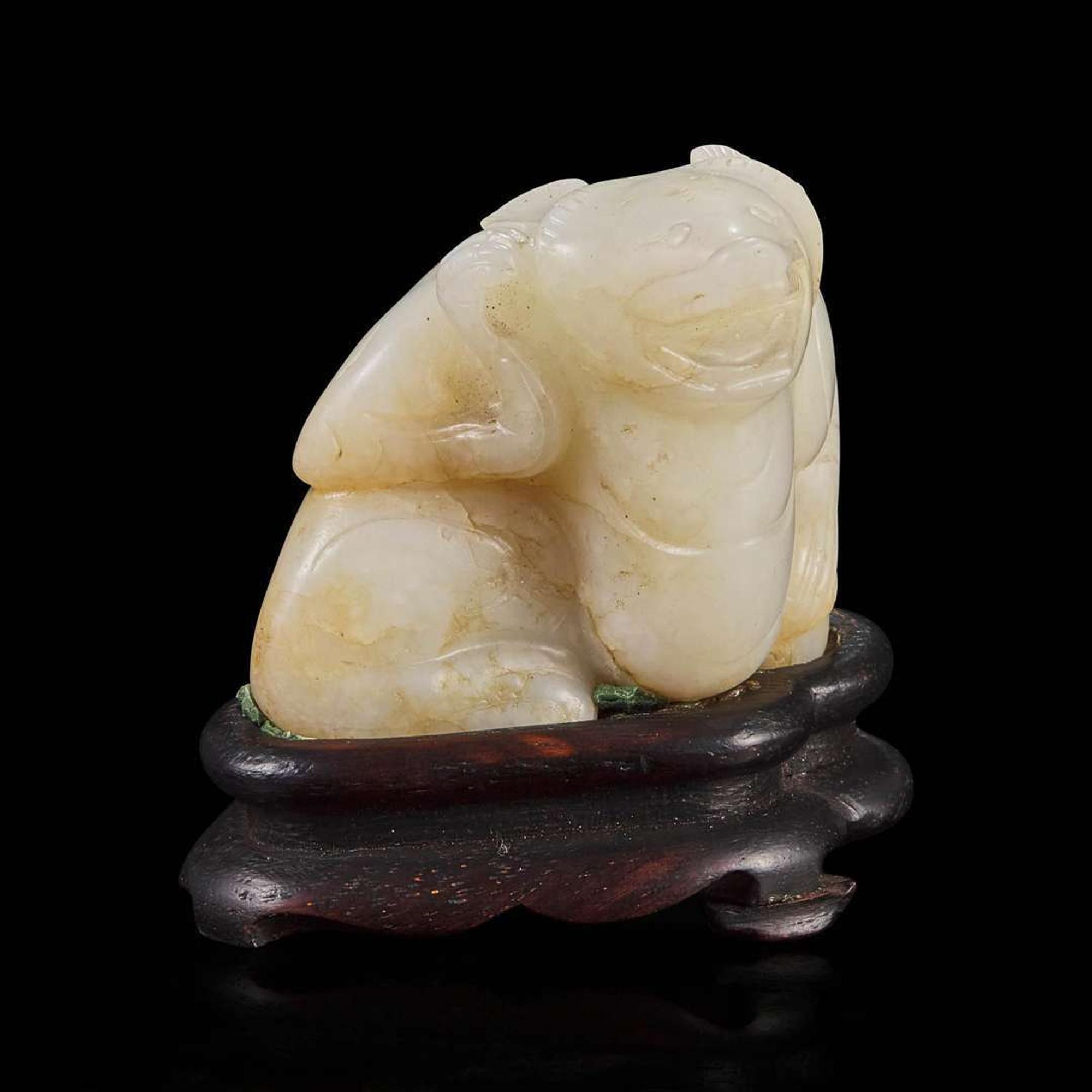 A Chinese creamy-white jade carving of a bear 白玉雕熊 Qing dynasty or earlier ????