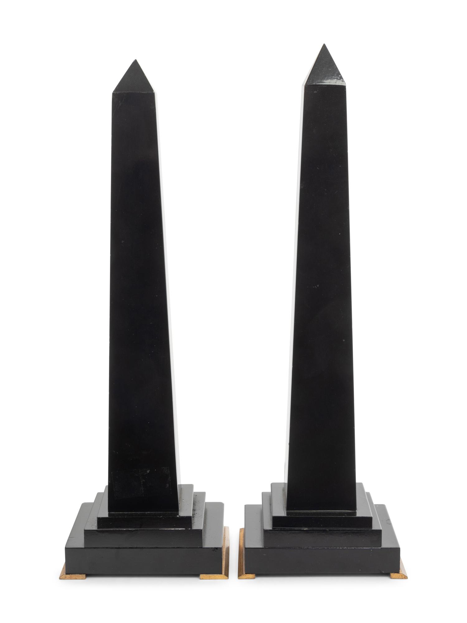 A Pair of Black Marble Obelisks