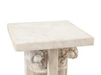 A Pair of Continental Carved Marble and Onyx Quadripartite Pedestals
