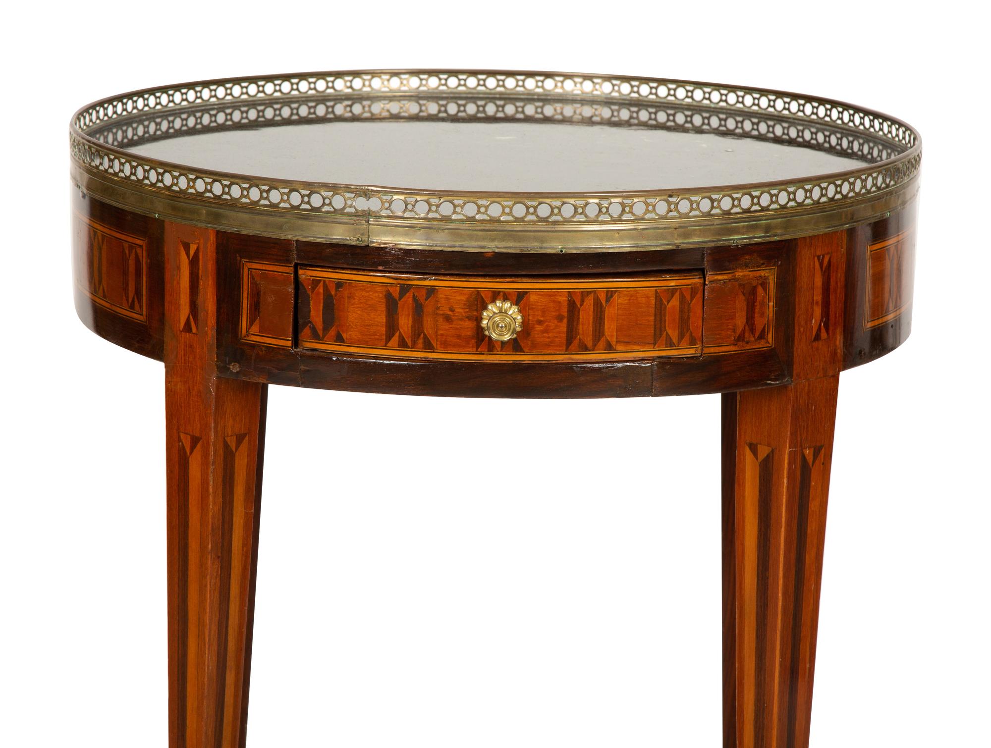 A Louis XVI Style Marquetry Marble-Top Gueridon