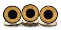 A Set of Fourteen Porcelain Plates Diameter 10 3/4 inches.