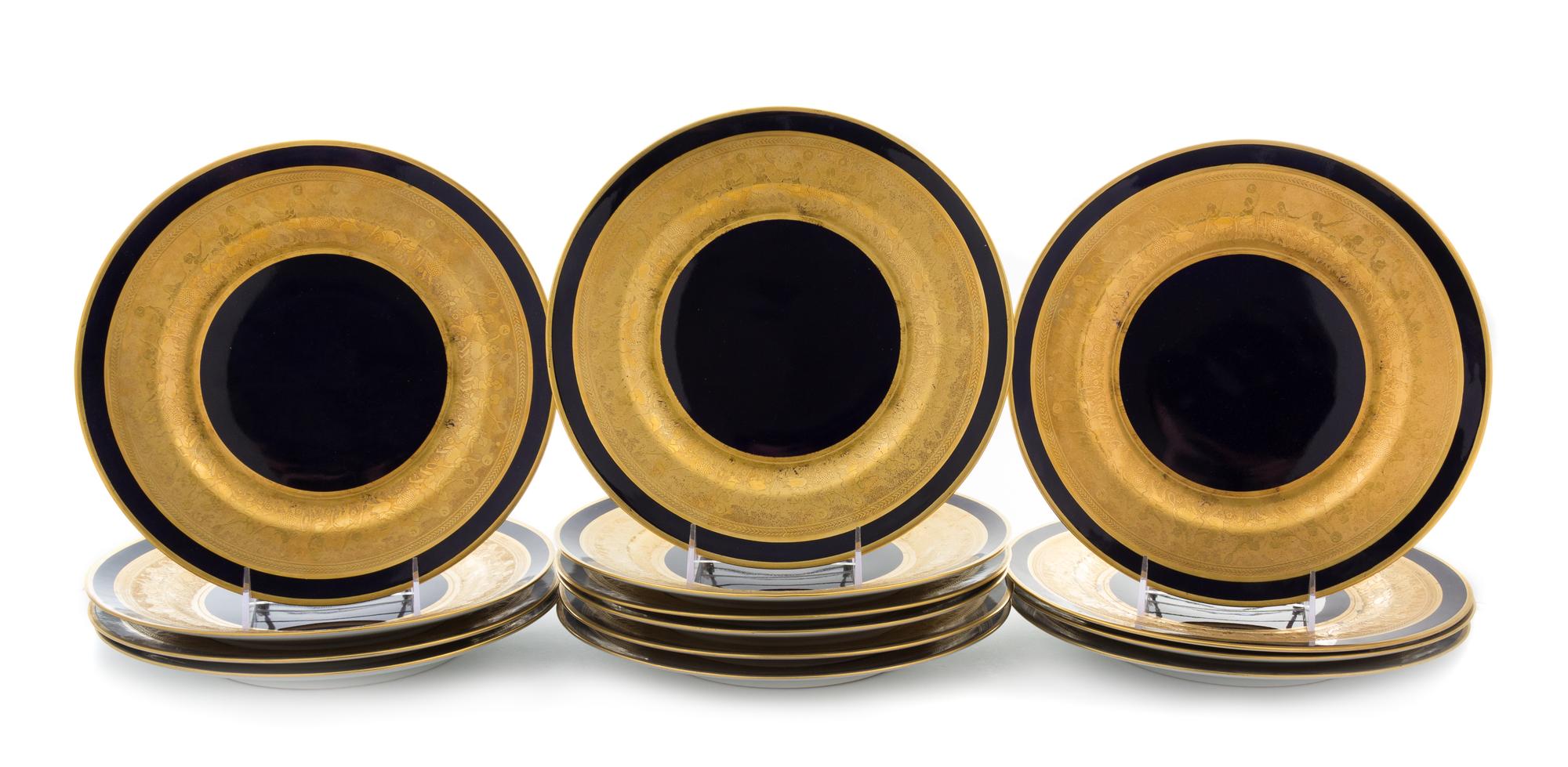 A Set of Fourteen Porcelain Plates Diameter 10 3/4 inches.