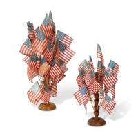 [FLAGS]. Two turned wooden flag holders. Late 19th-early 20th century.