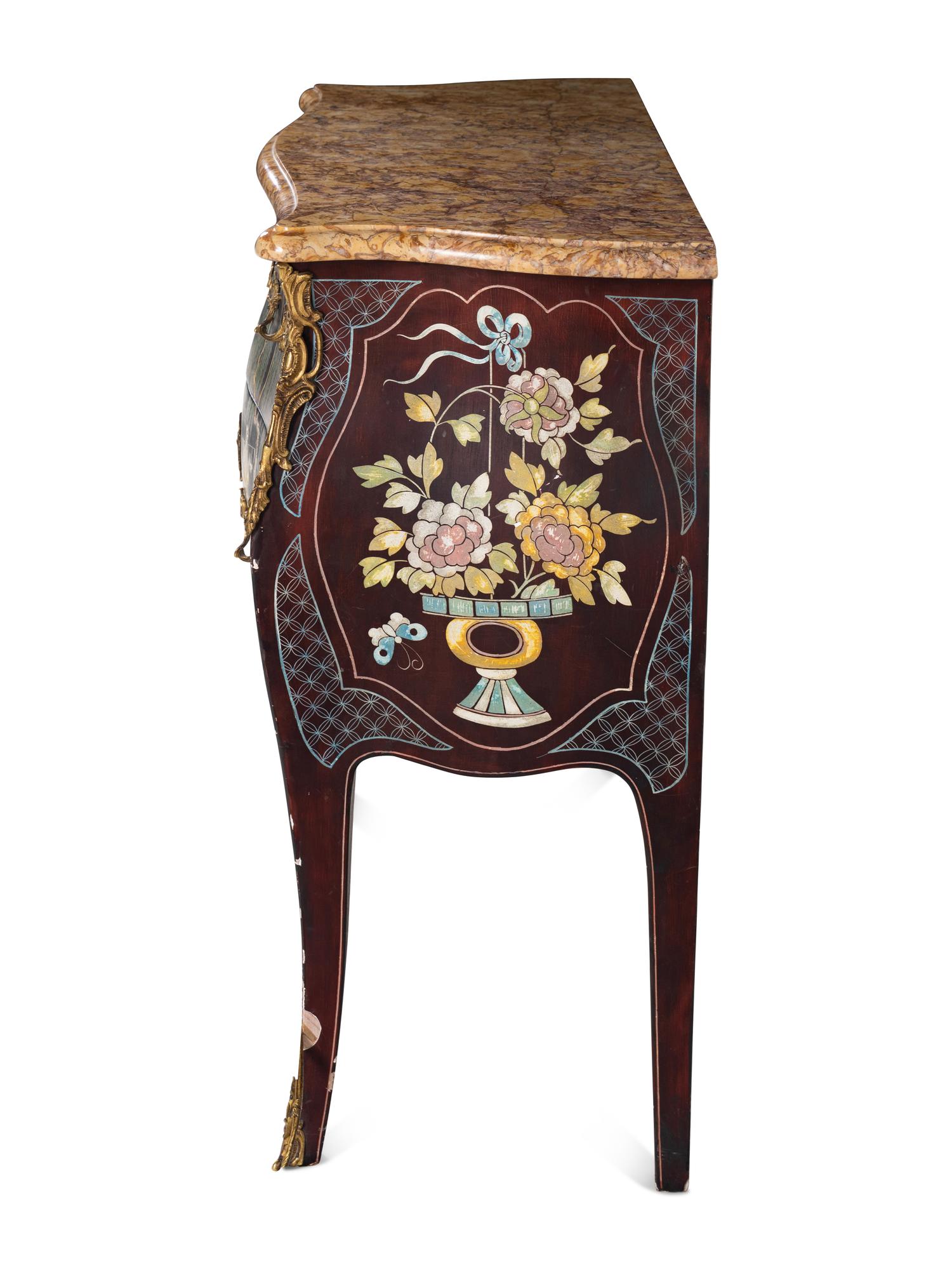 A Louis XVI Style Gilt Metal Mounted Lacquered Marble-Top Commode