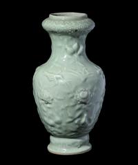 A Chinese Molded Celadon Glazed Porcelain Vase