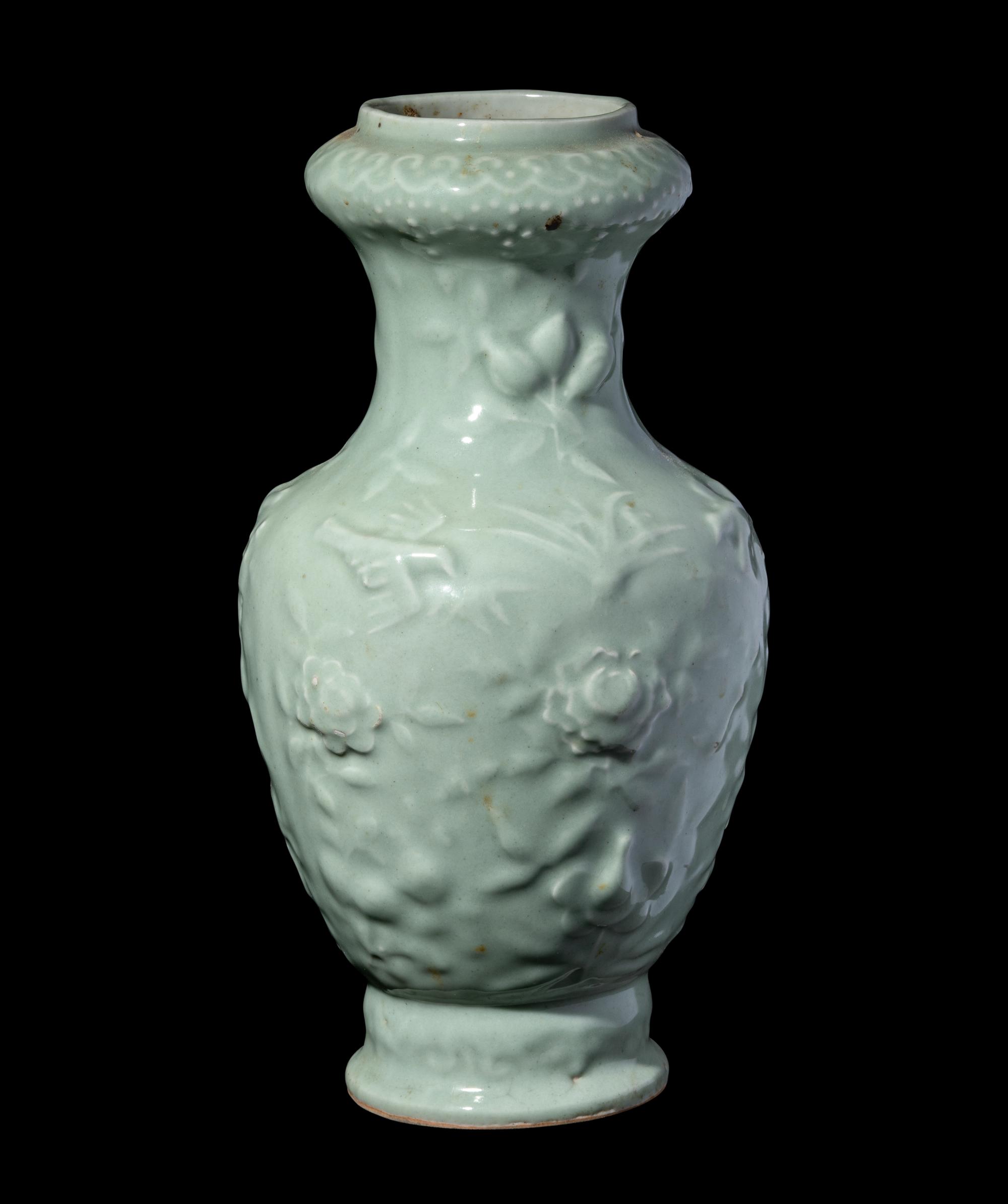 A Chinese Molded Celadon Glazed Porcelain Vase