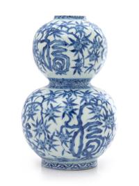 A Chinese Blue and White Gourd-Form Porcelain Vase