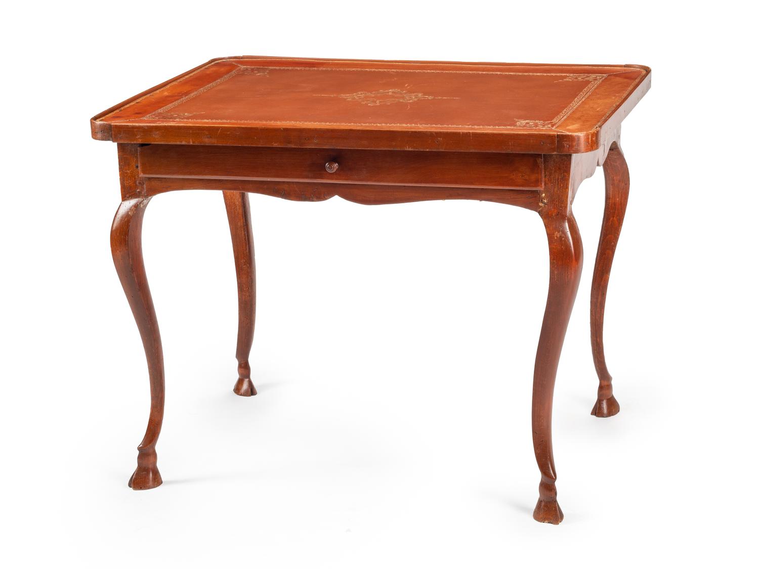 A French Provincial Fruitwood and Tooled Leather Writing Table