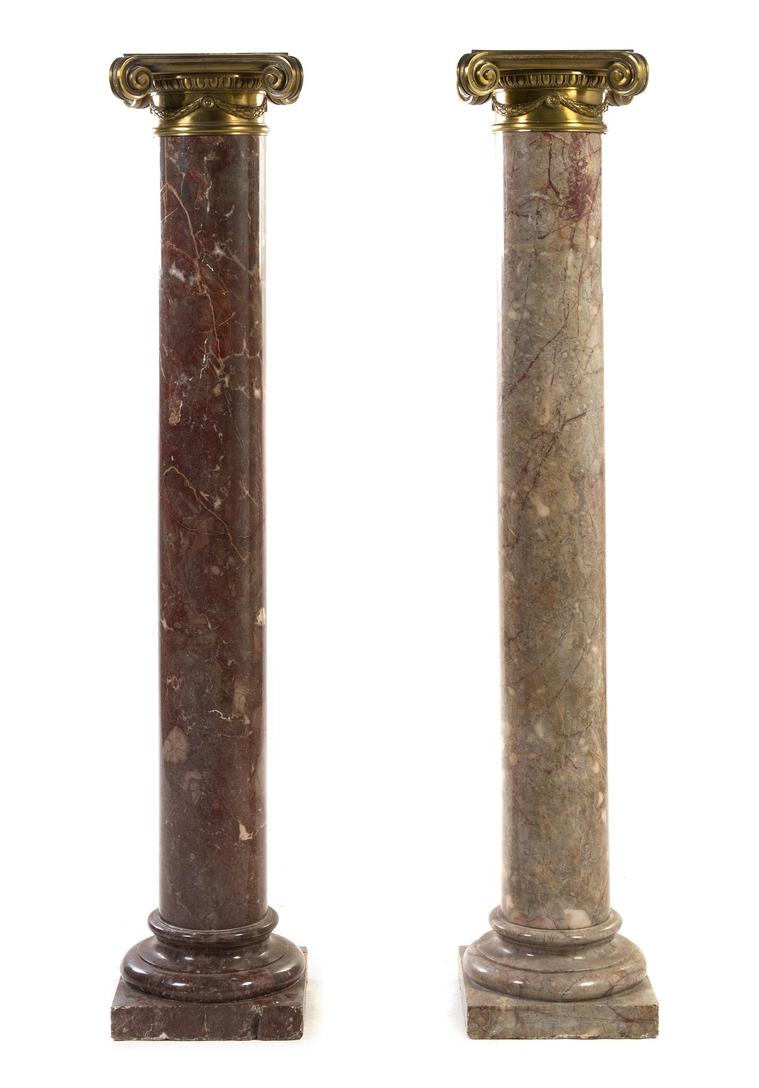 A Pair of Louis XVI Style Gilt Bronze Mounted Marble Columns, Height 57 1/4 inches.