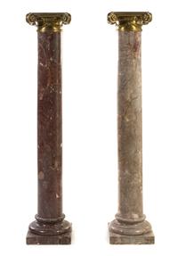 A Pair of Louis XVI Style Gilt Bronze Mounted Marble Columns, Height 57 1/4 inches.