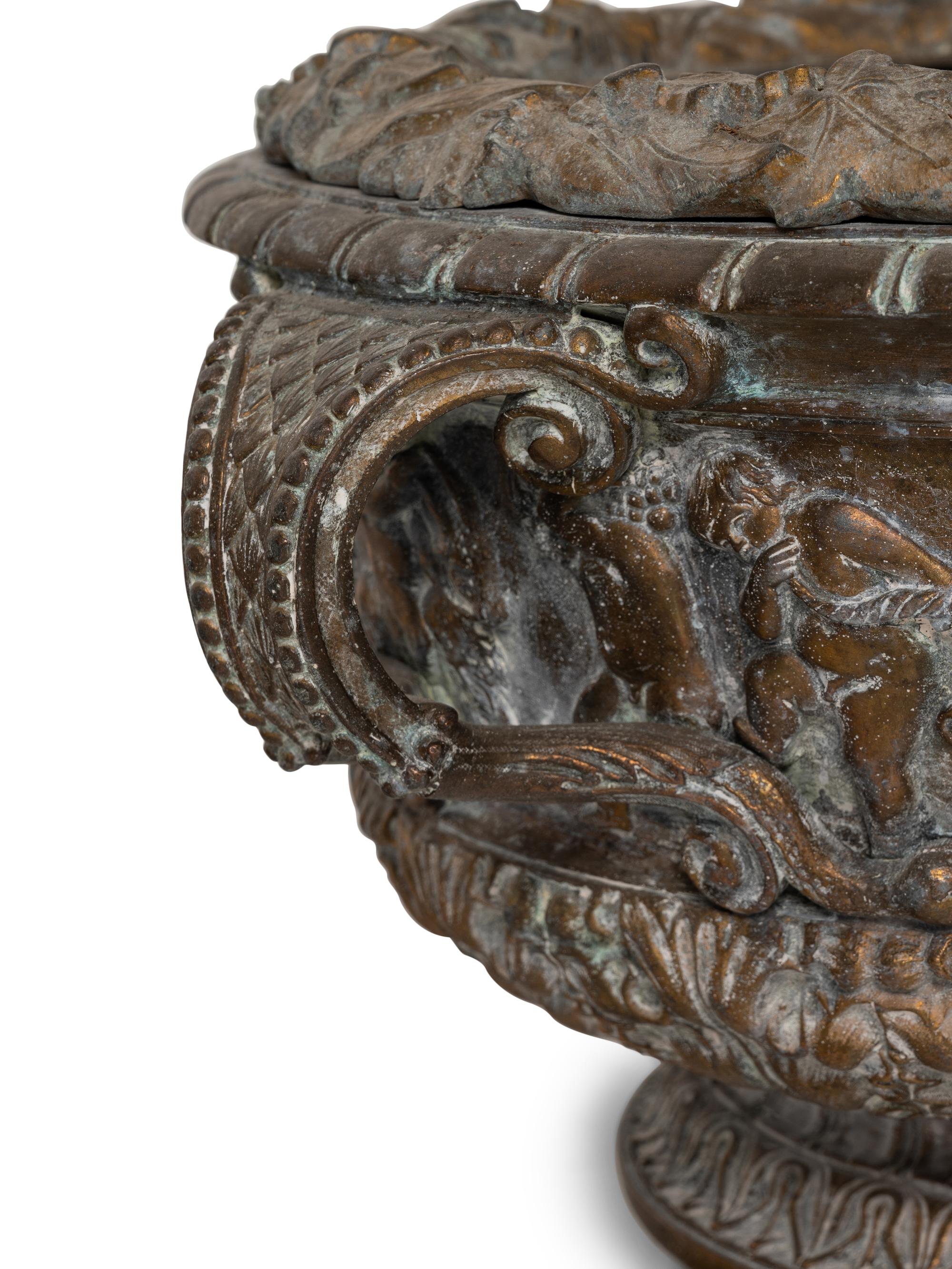 A Brass Two-Handled Jardinière with Bacchic Figures