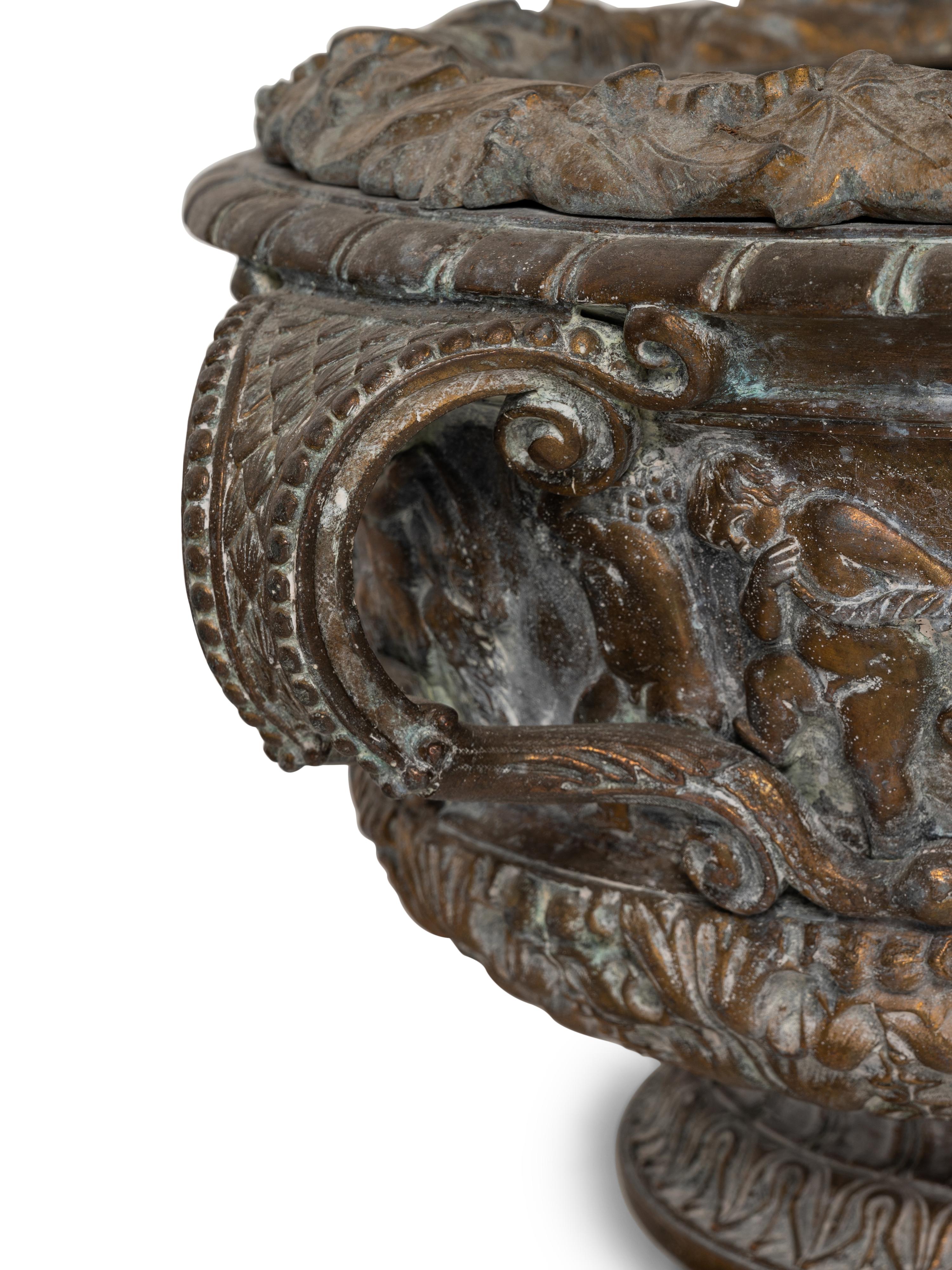 A Brass Two-Handled Jardinière with Bacchic Figures