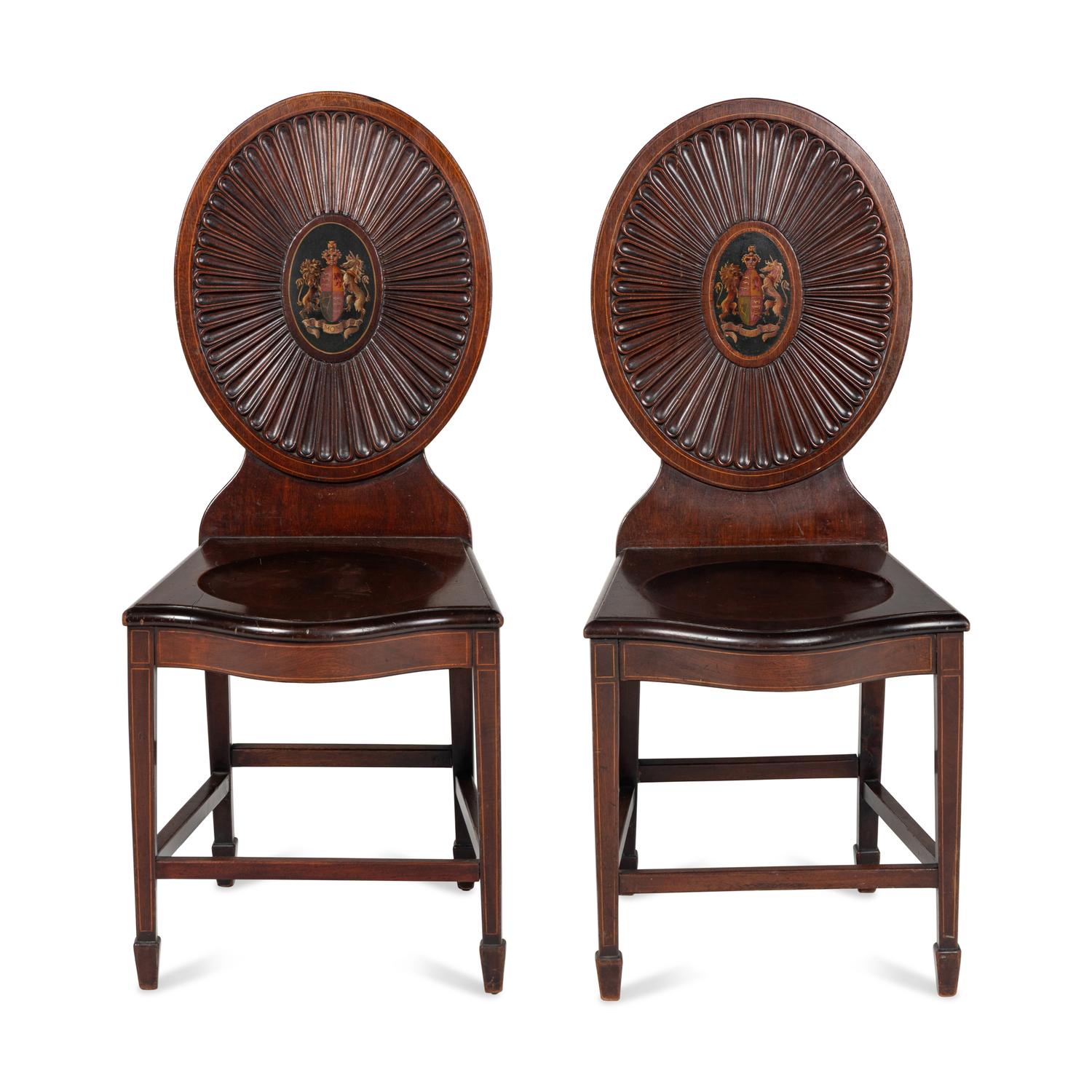 A Pair of Regency Style Mahogany and Polychrome Decorated Hall Chairs