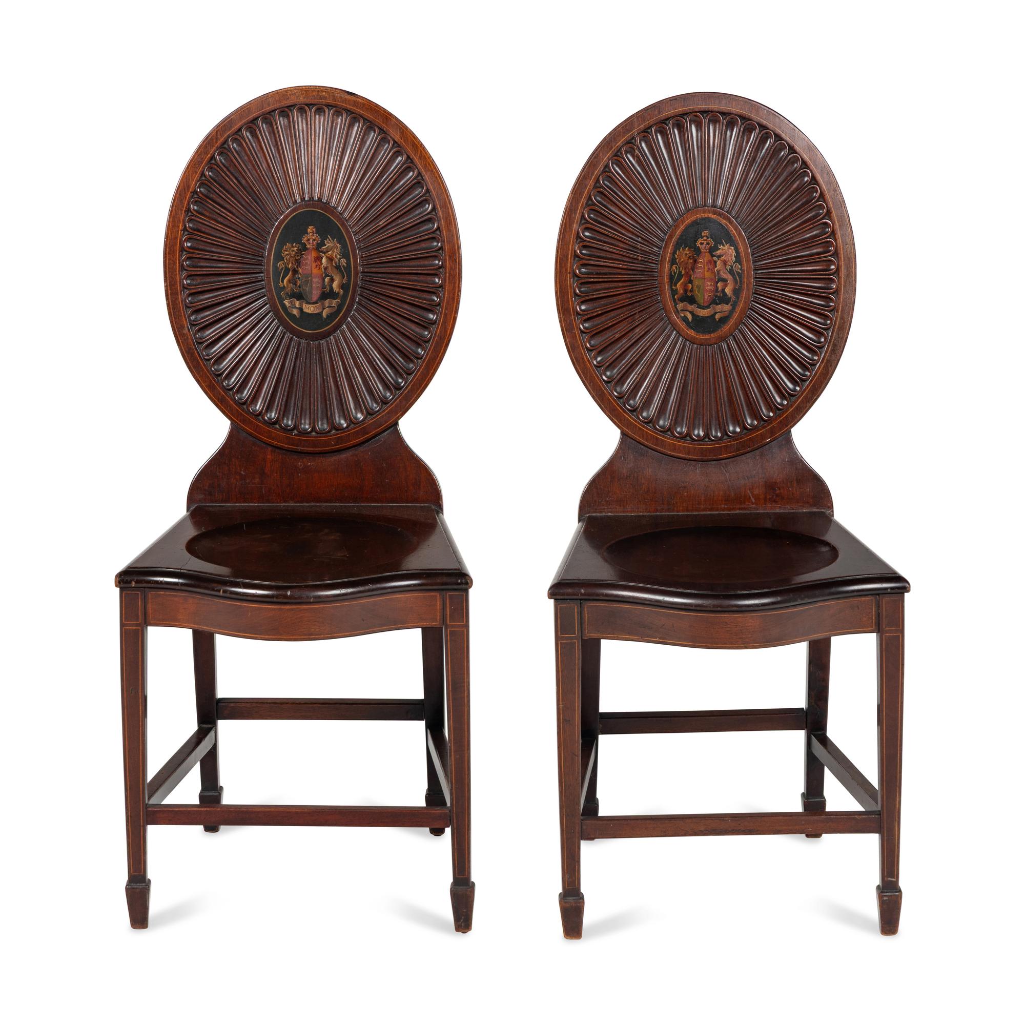 A Pair of Regency Style Mahogany and Polychrome Decorated Hall Chairs