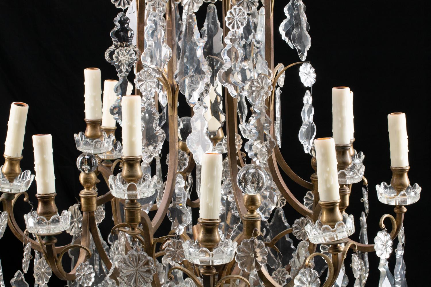 A Louis XV Style Bronze and Glass Twelve-Light Chandelier