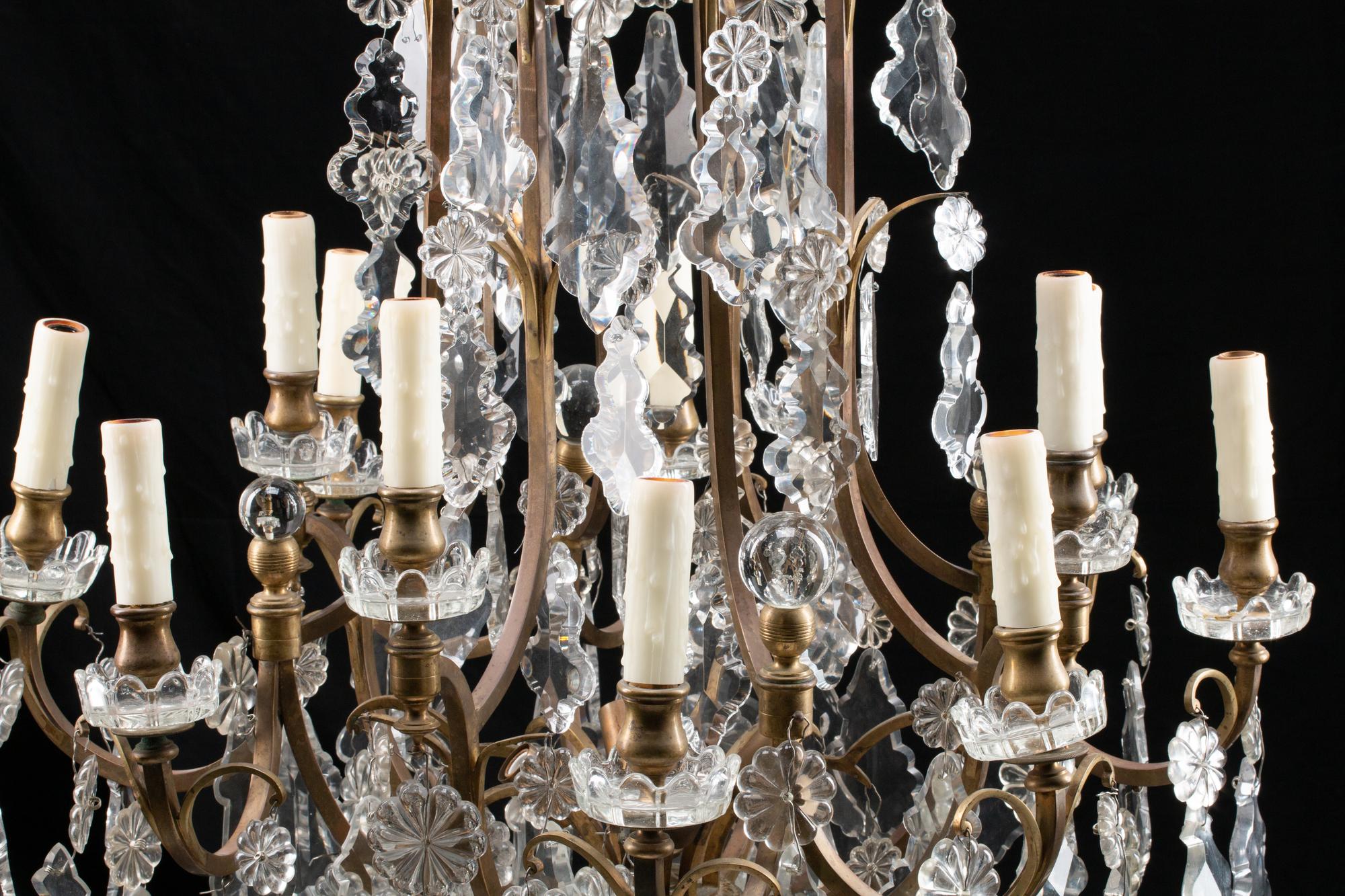 A Louis XV Style Bronze and Glass Twelve-Light Chandelier