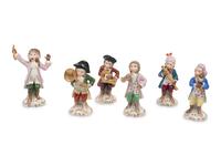 A German Porcelain Twelve-Piece Monkey Band