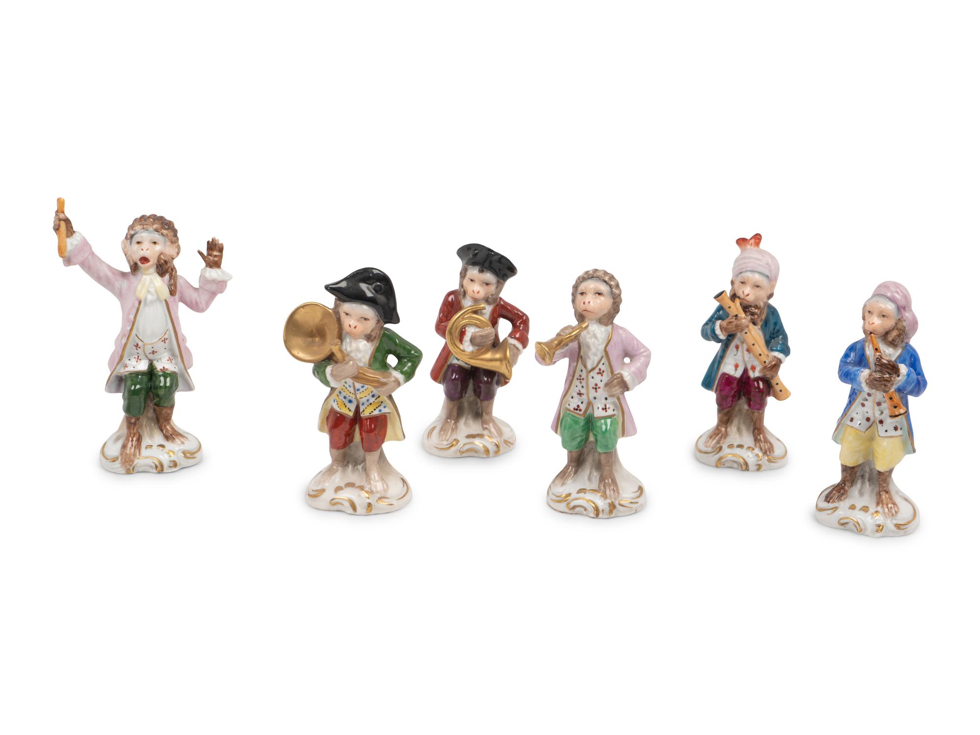 A German Porcelain Twelve-Piece Monkey Band