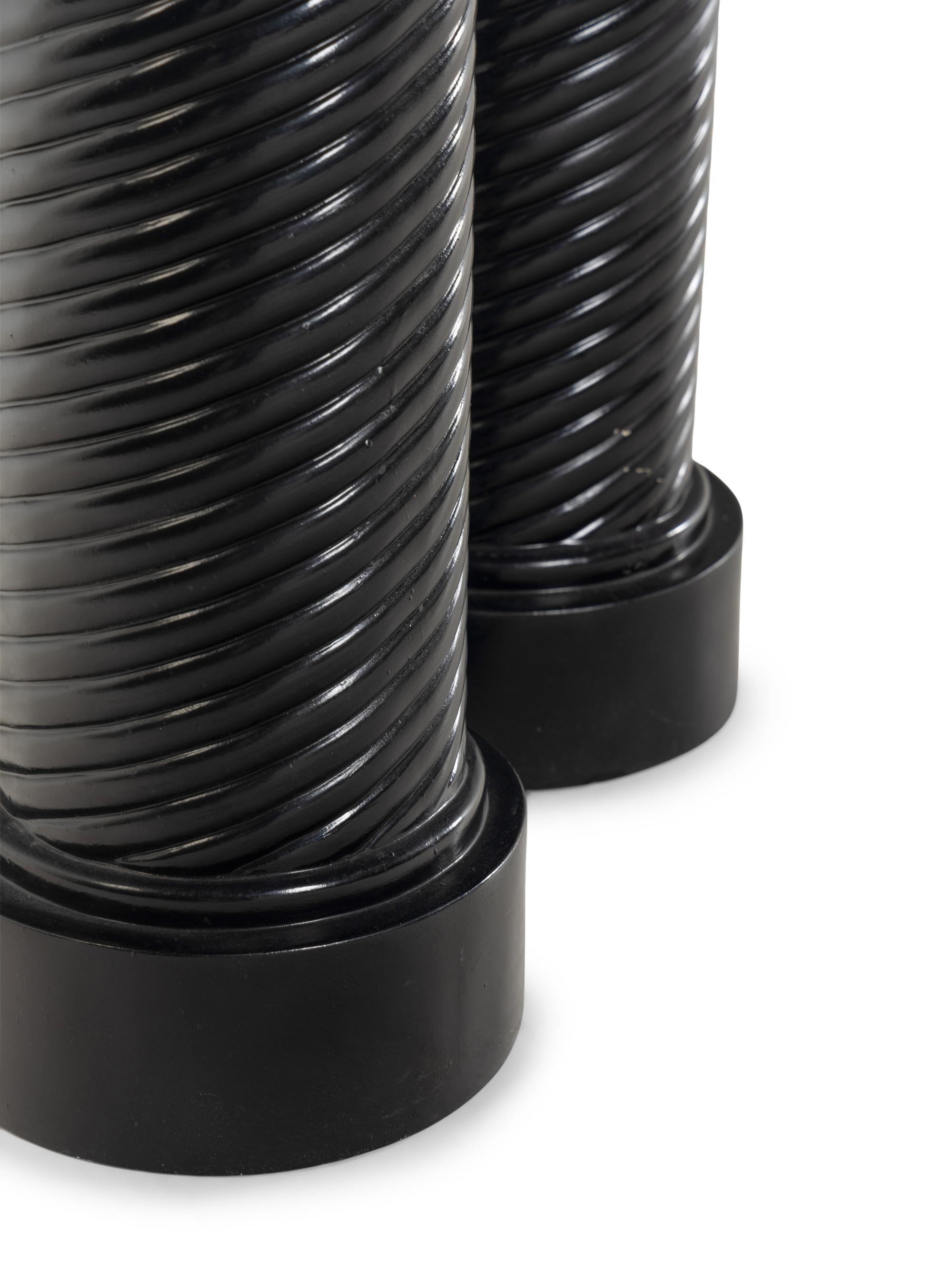 A Pair of Black Painted Composition Pedestals