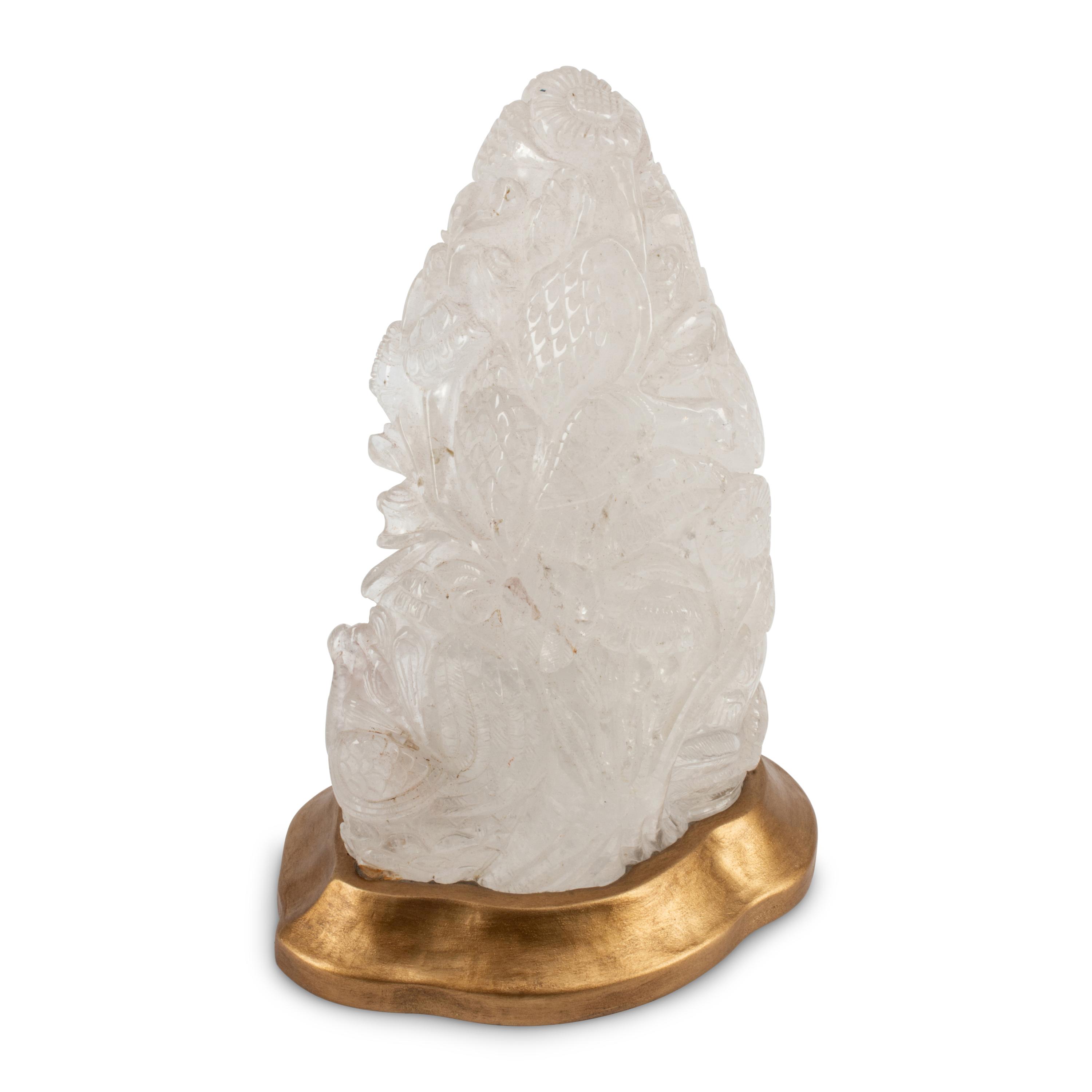 A Carved Rock Crystal Seated Buddha
