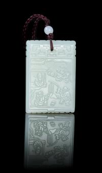 A Carved Pale Celadon Jade Plaque Height 2 inches.
