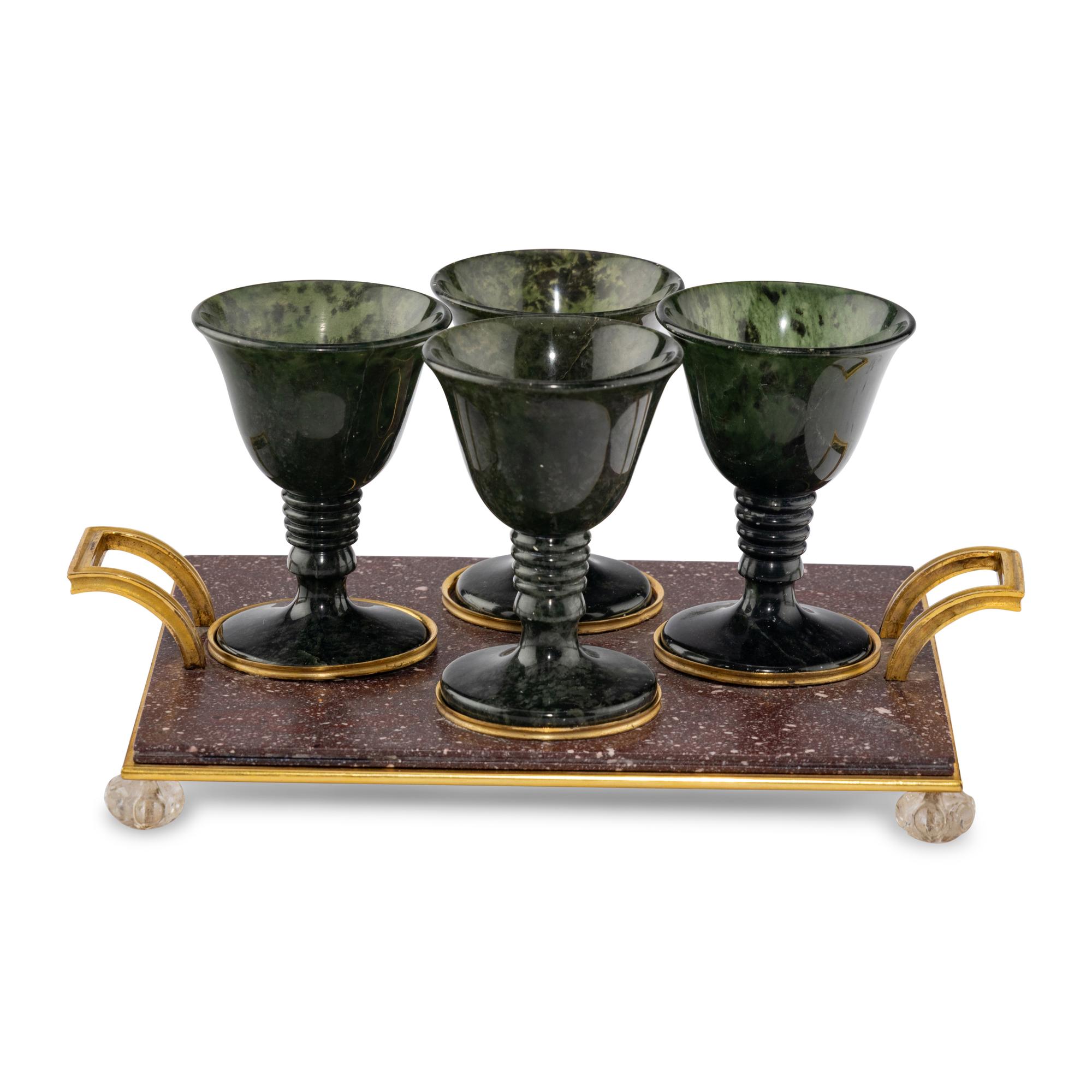 A Gilt Bronze Mounted Porphyry and Spinach Jade Cordial Set
