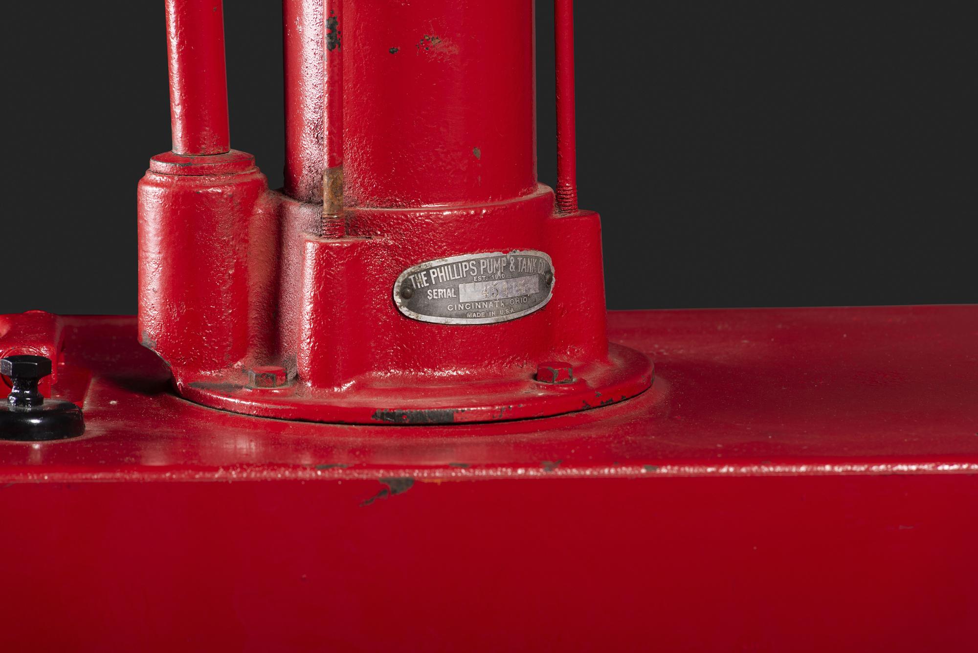 A Sohio Oil Dispenser with Hand Pump