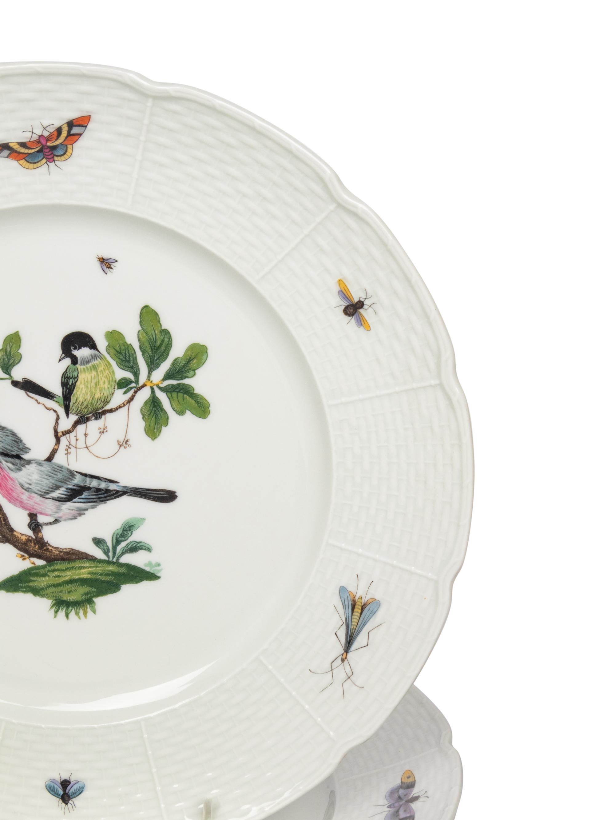 A Raynaud Limoges Porcelain Dinner Service