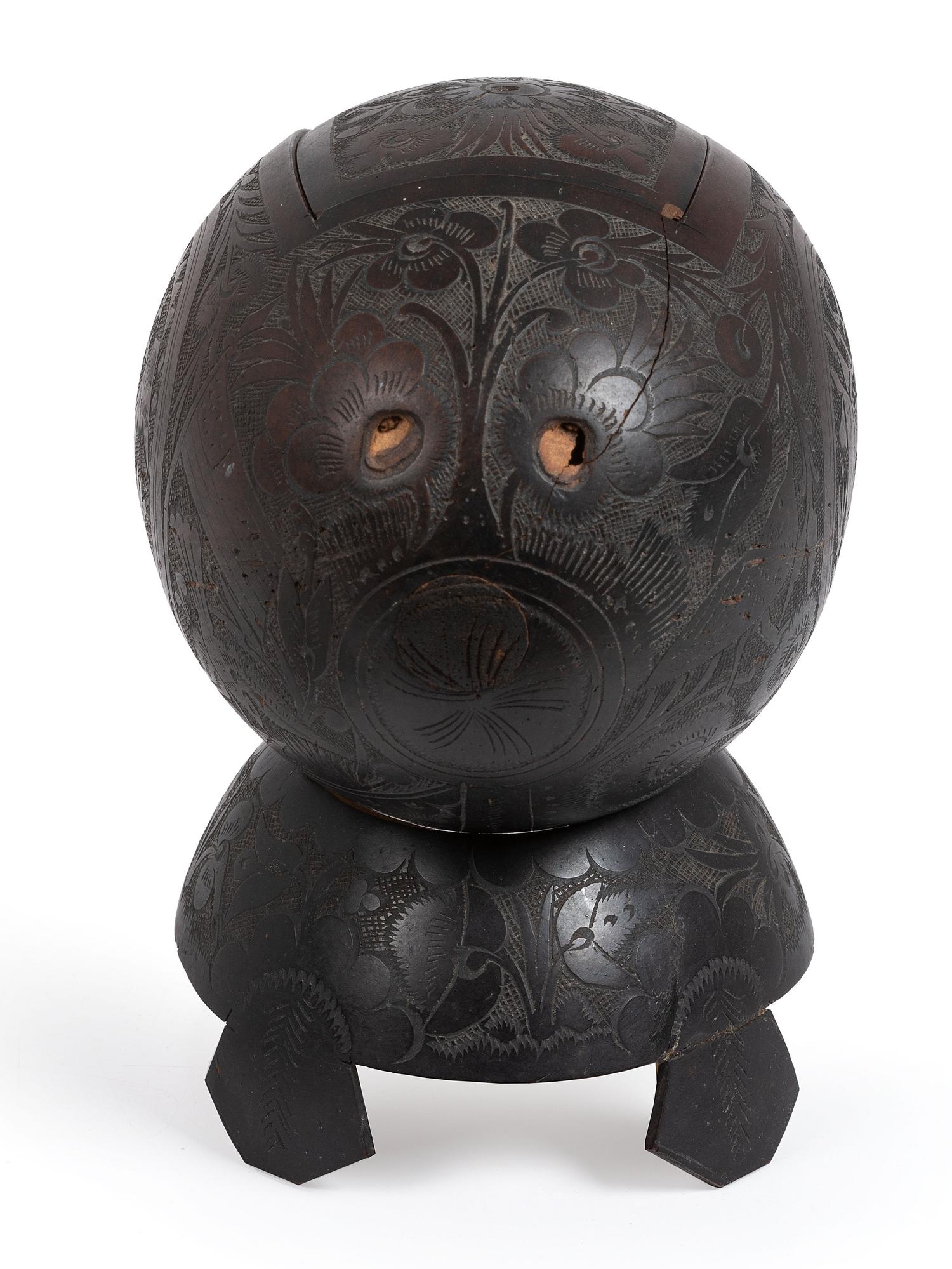 [AMERICANA]. Patriotic carved coconut shell with display stand.