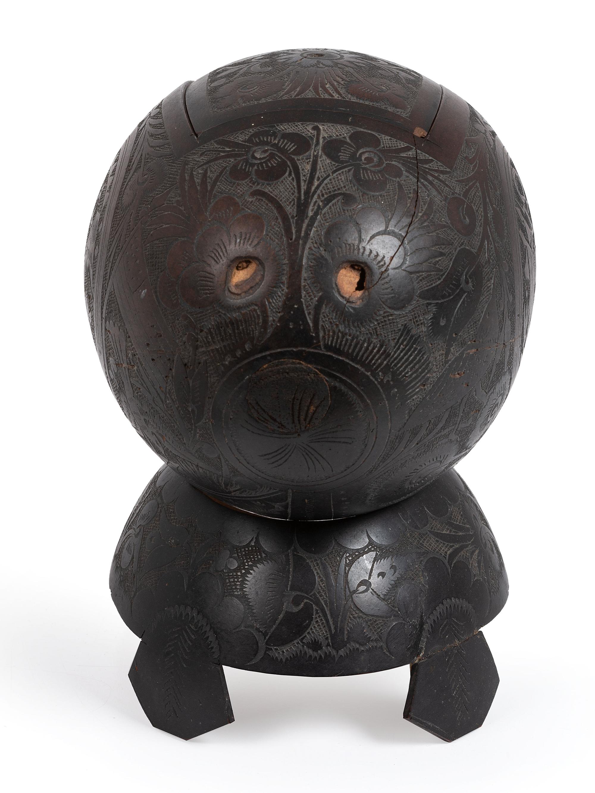 [AMERICANA]. Patriotic carved coconut shell with display stand.