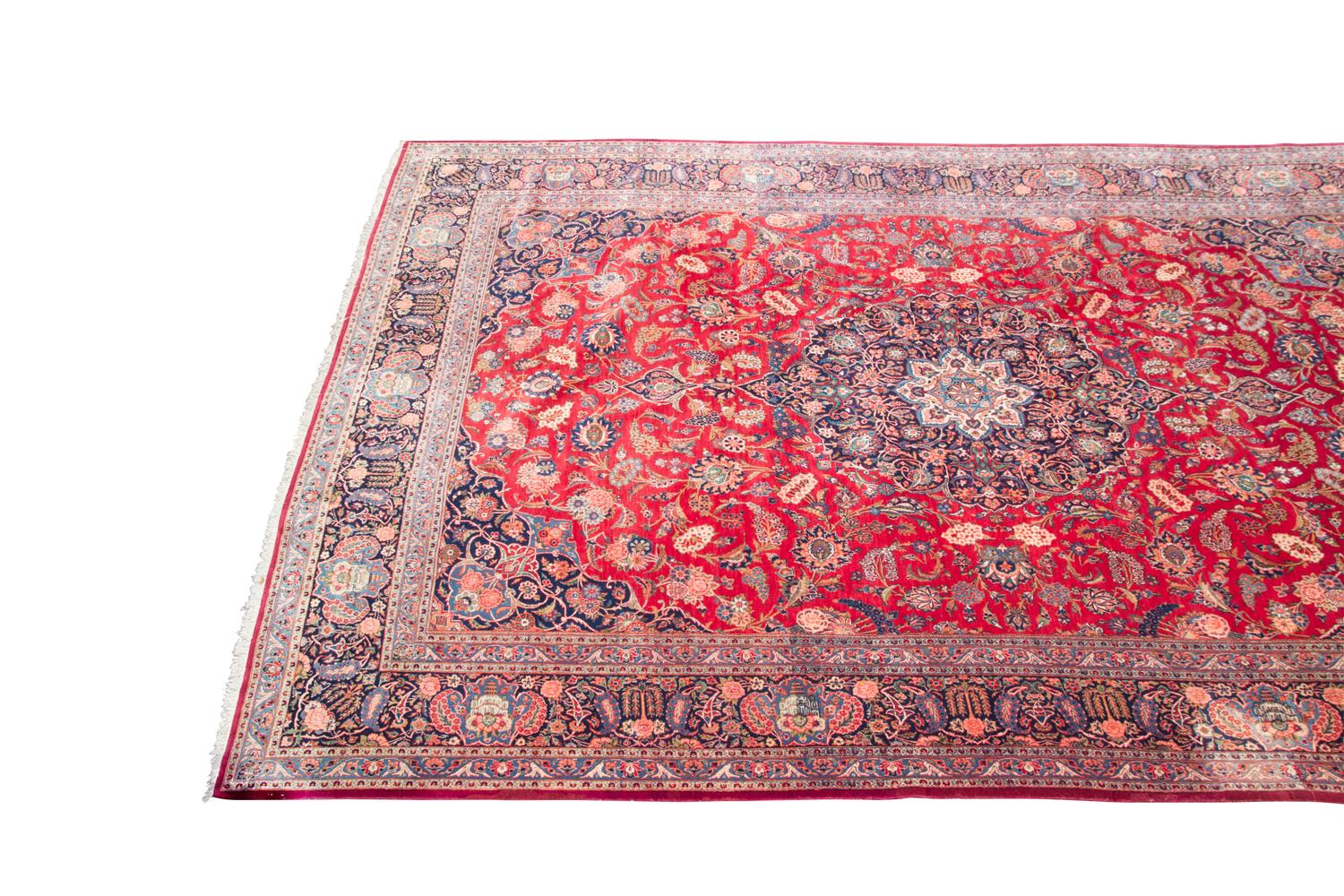 A Kashan Carpet 14 feet x 10 feet. — 20TH CENTURY