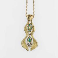 An 18K yellow gold, emerald, and diamond necklace