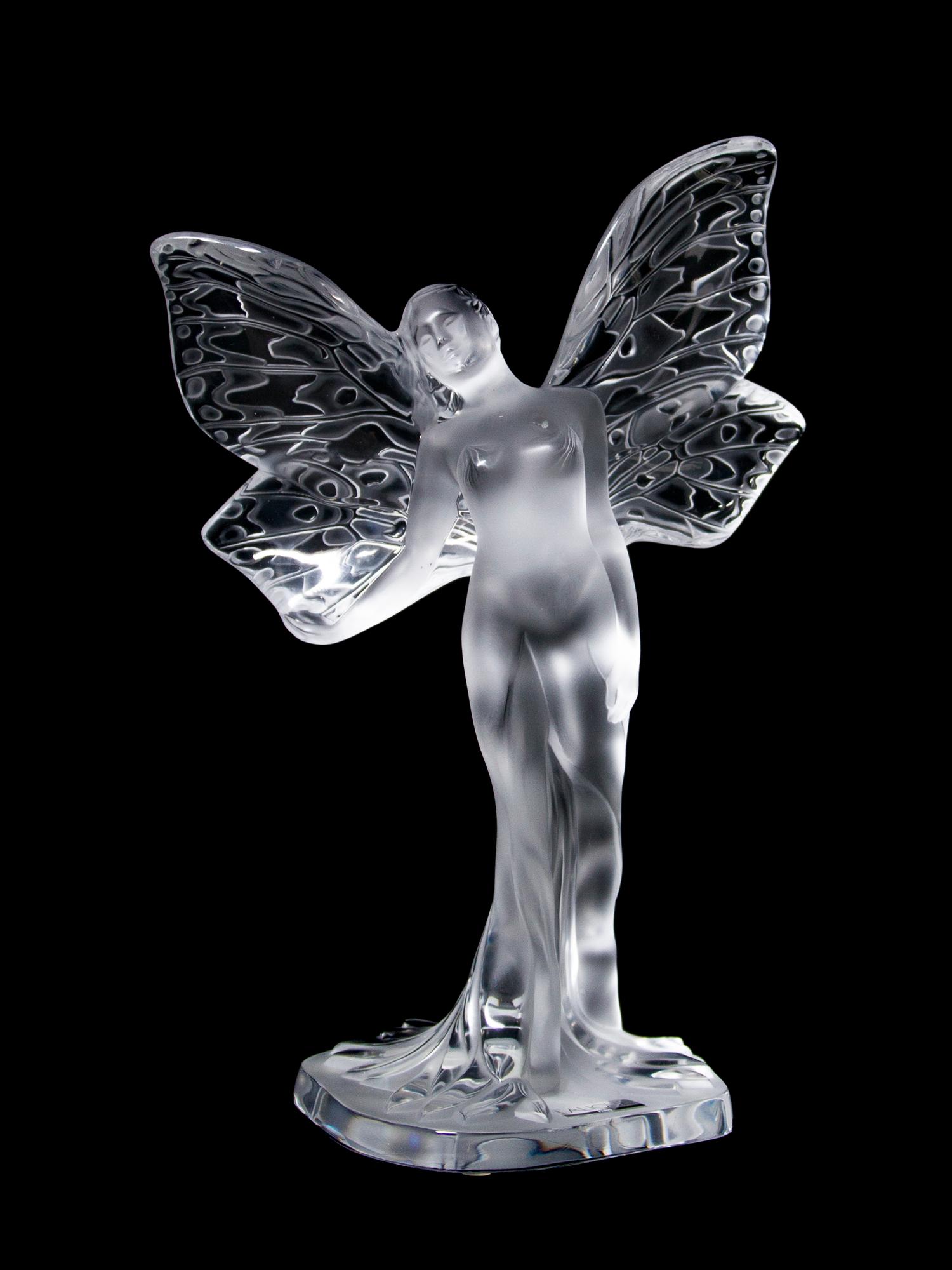 A Lalique Molded and Frosted Glass Figure, Height 9 1/2 inches.