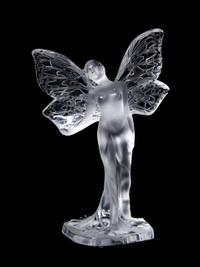 A Lalique Molded and Frosted Glass Figure, Height 9 1/2 inches.