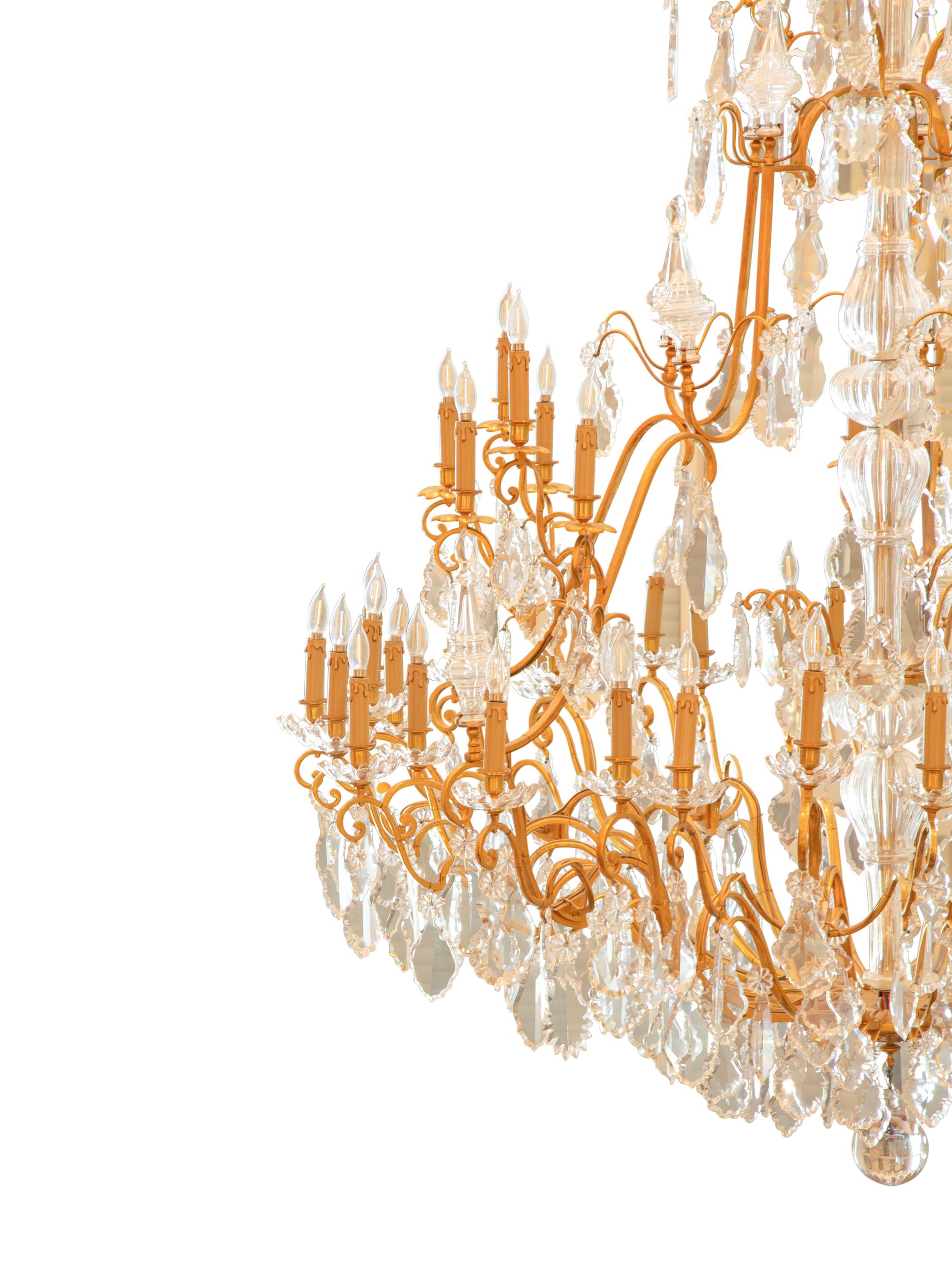 A Massive Gilt Bronze and Baccarat Cut Glass Chandelier from Hôtel Claridge, Paris
