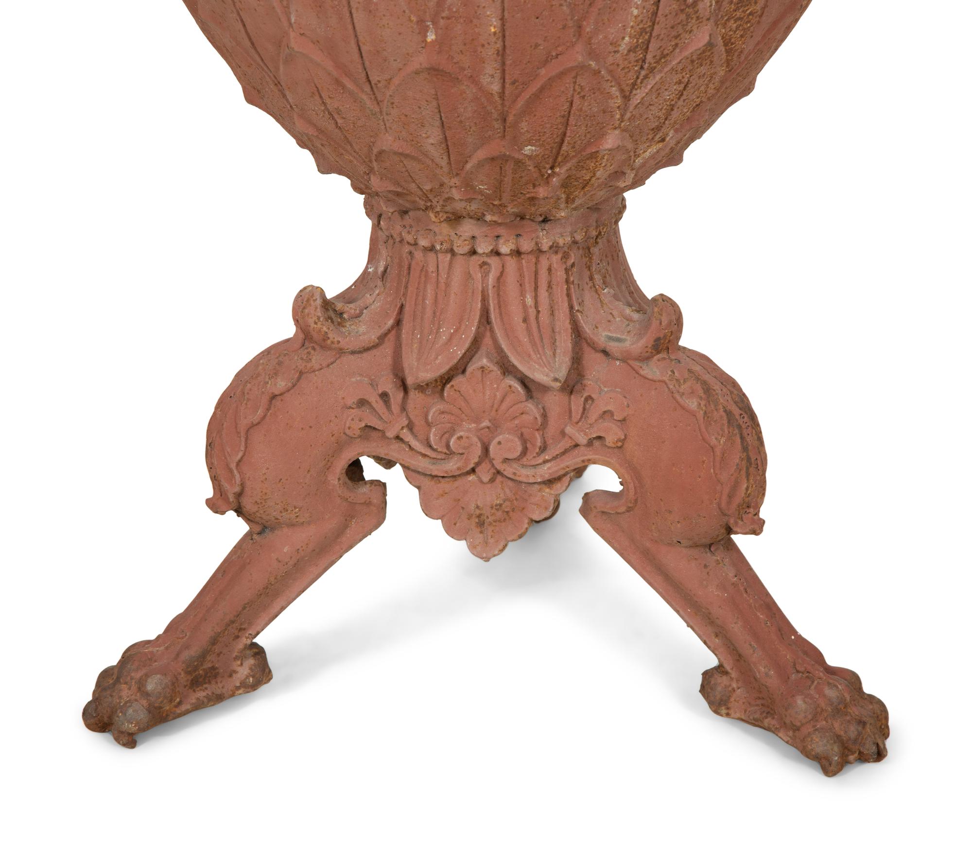 A Pair of Continental Iron Tripod Jardinières