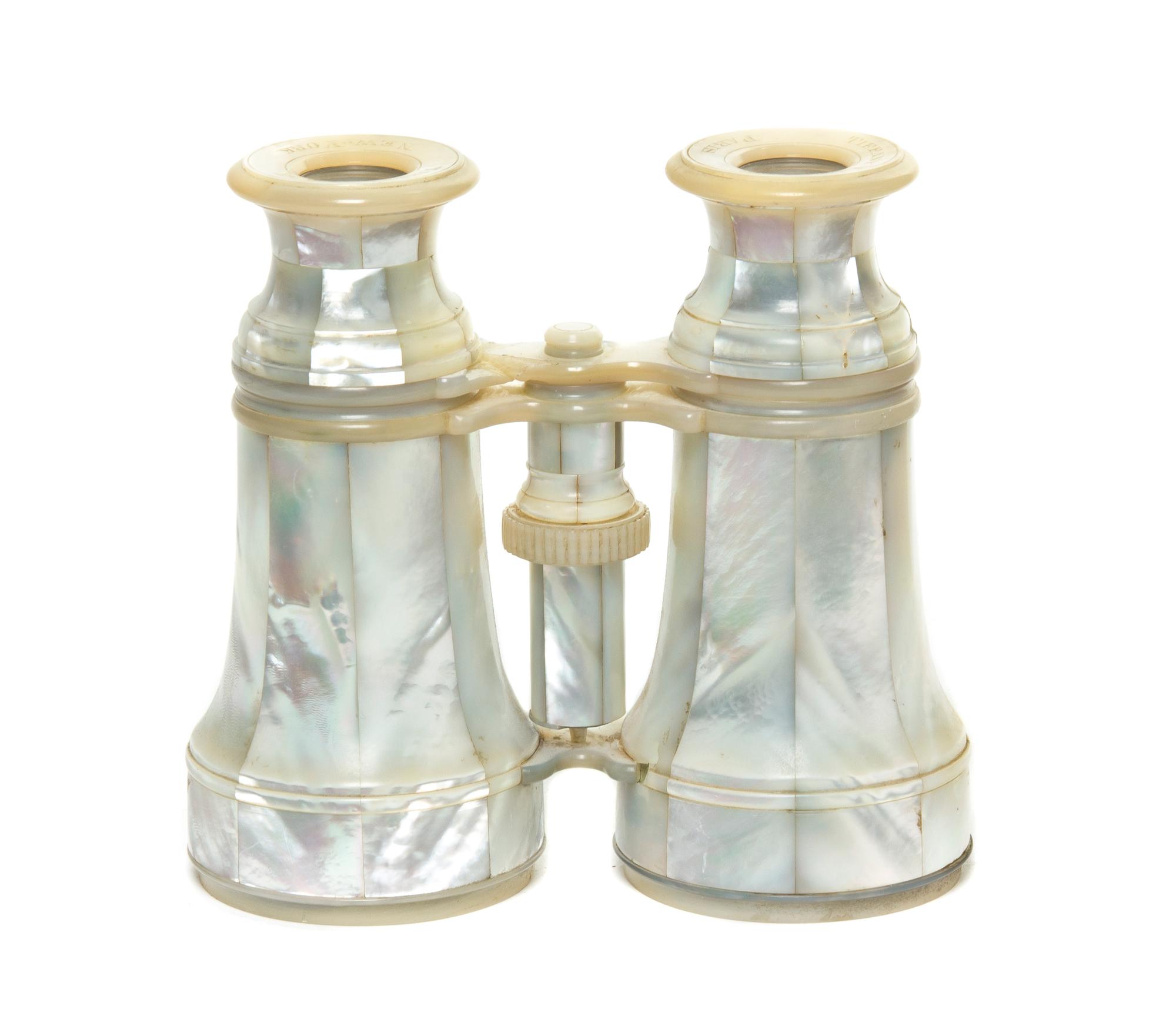 A Pair of French Mother-of-Pearl Veneered Opera Glasses, Tiffany Reed & Co., Width 4 3/4 inches.