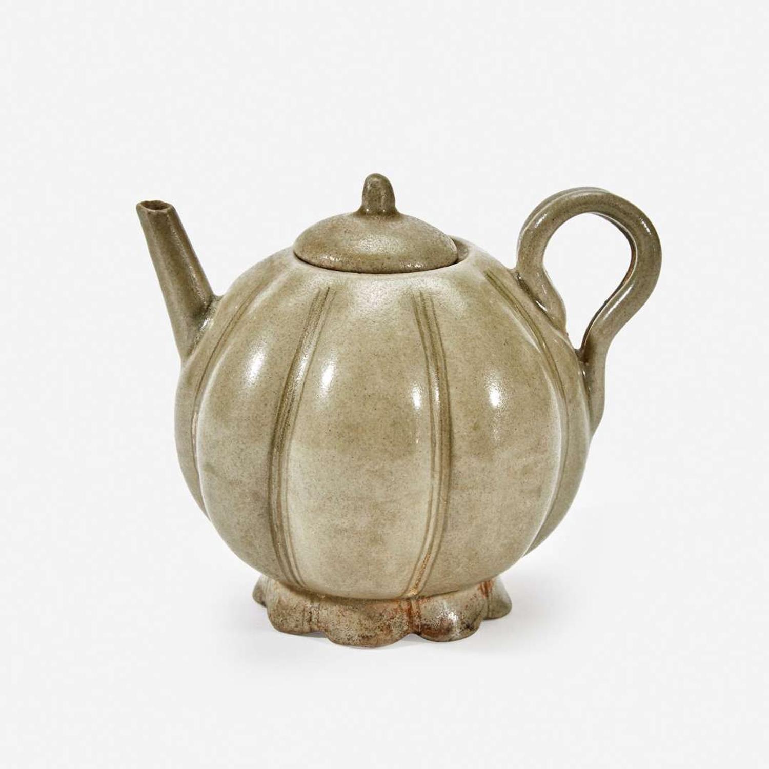 A Chinese celadon-glazed melon-form small ewer and cover Song Dynasty