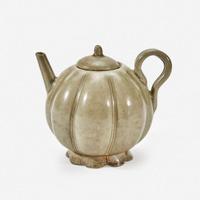 A Chinese celadon-glazed melon-form small ewer and cover Song Dynasty