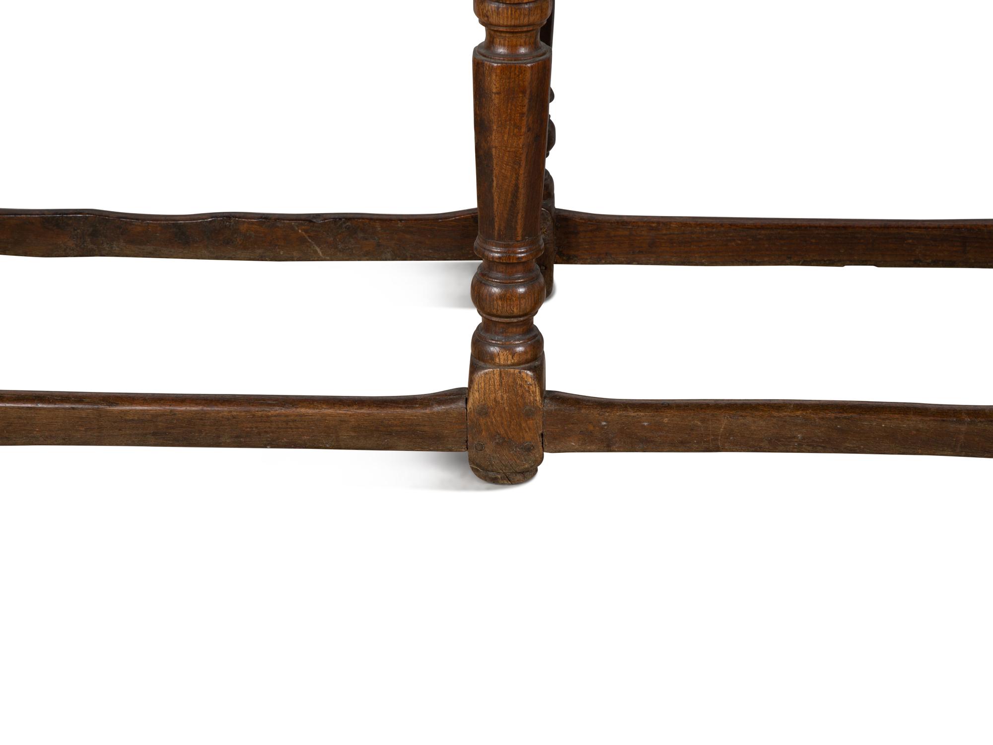 An English Walnut Tavern Table — 18TH CENTURY
