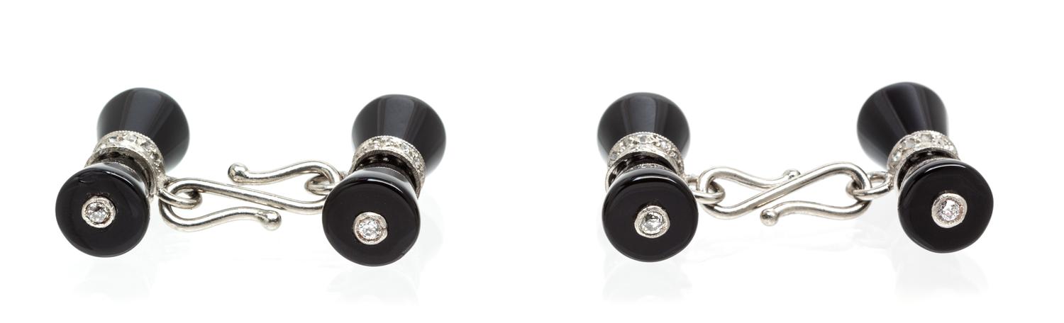 A Pair of Platinum, Onyx and Diamond Cufflinks, French, 6.50 dwts.