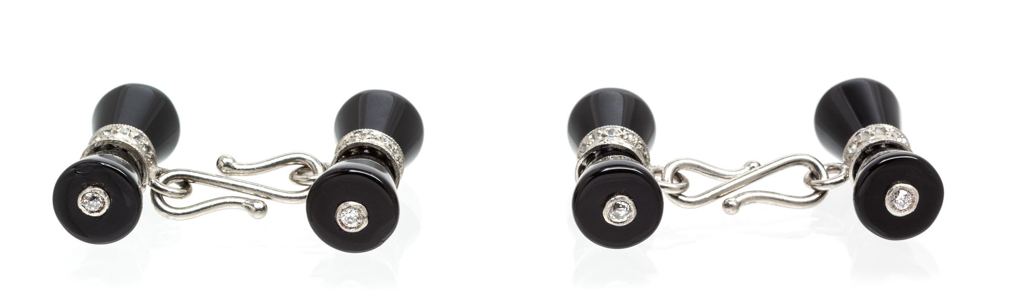 A Pair of Platinum, Onyx and Diamond Cufflinks, French, 6.50 dwts.