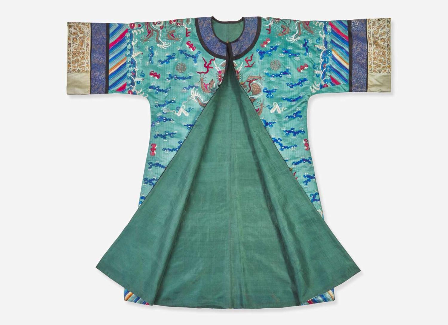 A Chinese embroidered teal blue silk "Dragon" surcoat, late 19th to 20th century 刺繡青藍龍紋袍 十九或二十世紀