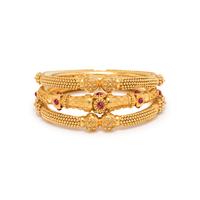 COLLECTION OF YELLOW GOLD BANGLE BRACELETS