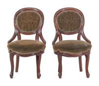 A Pair of Victorian Rococo Revival Walnut Side Chairs and a Victorian Side Table