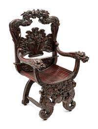 A Chinese Export Carved Hardwood Armchair